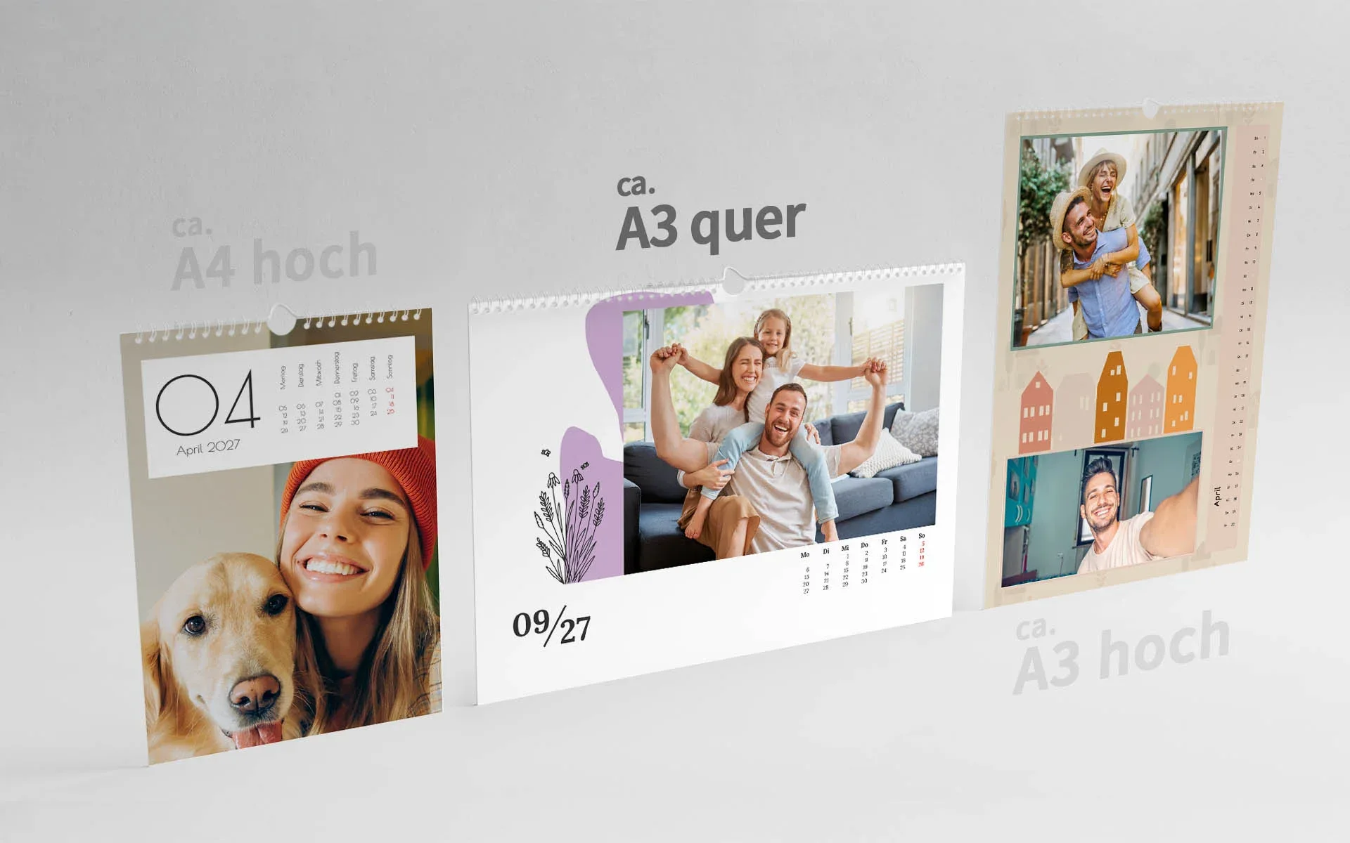 HappyFotokalender ca. A3 quer 3 HappyFotokalender in den Formaten ca. A4 hoch, ca. A3 quer und ca. A3 hoch nebeneinander. Das Format ca. A3 quer ist hervorgehoben.