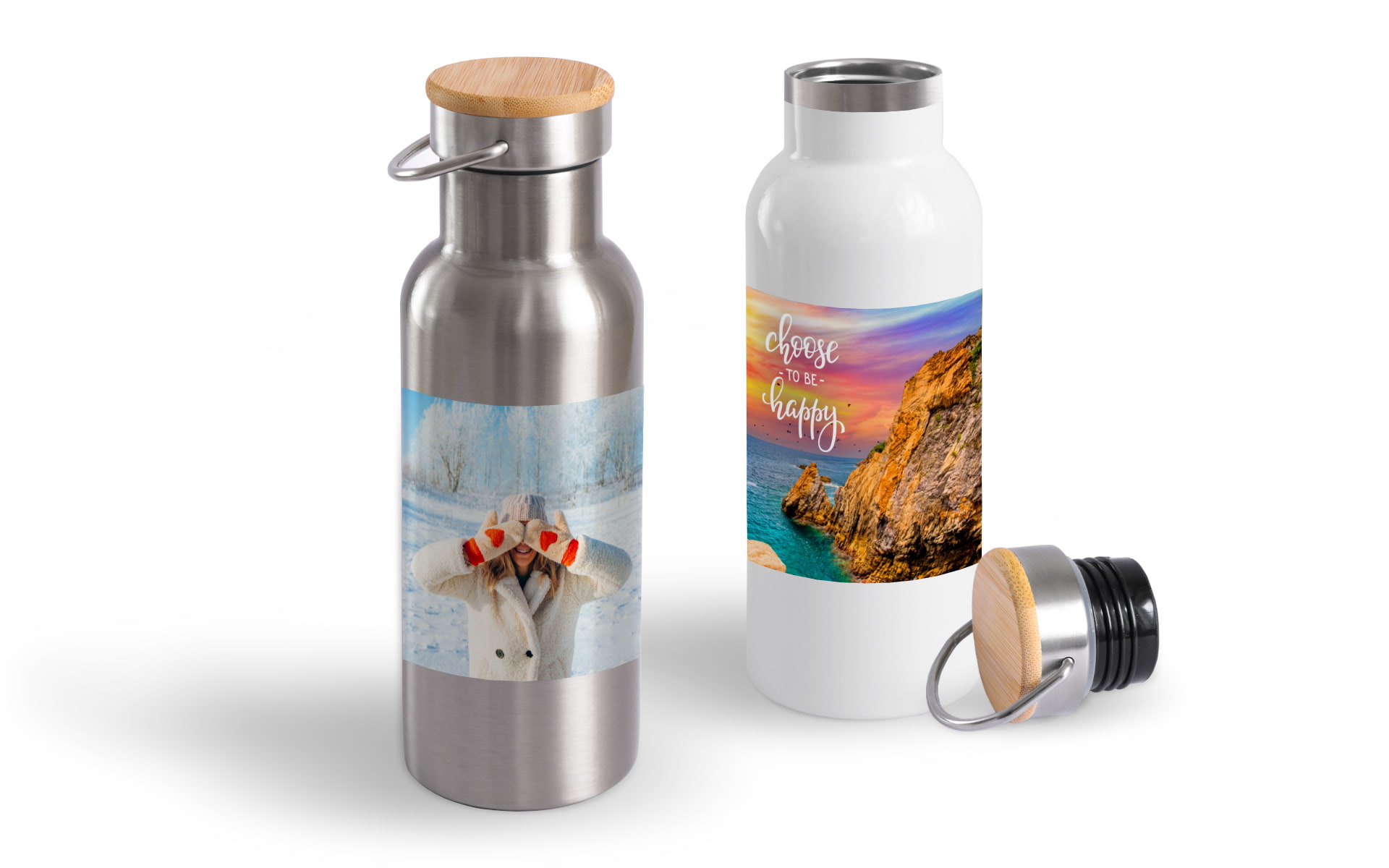 Zwei Wasserflaschen: eine aus Edelstahl mit Wintermotiv, die andere weiß mit motivierendem Spruch und Landschaftsbild.